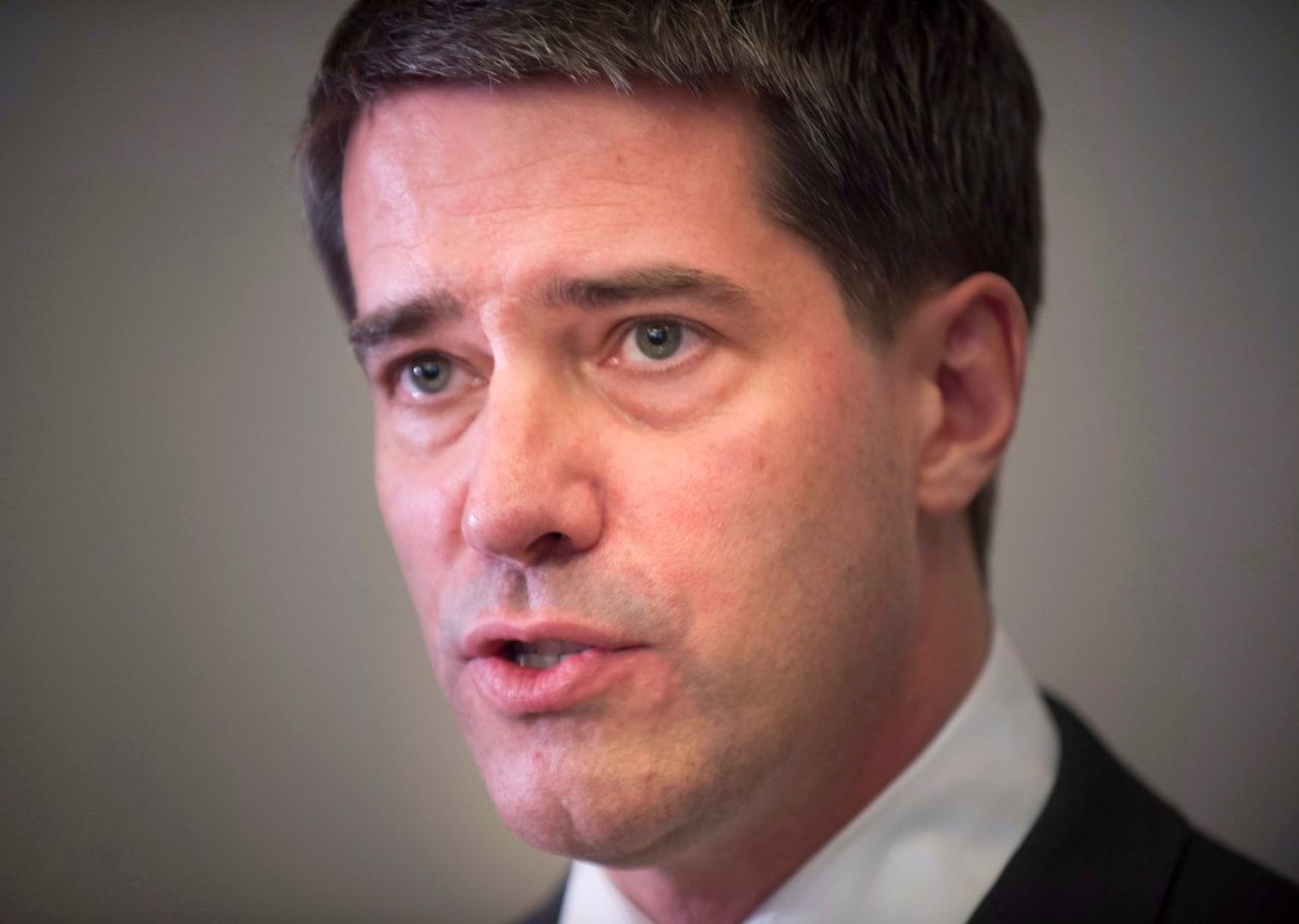 Former Parti Quebecois leader Andre Boisclair addresses a news conference in Montreal, Sunday, Sept.29, 2013. THE CANADIAN PRESS/Peter McCabe