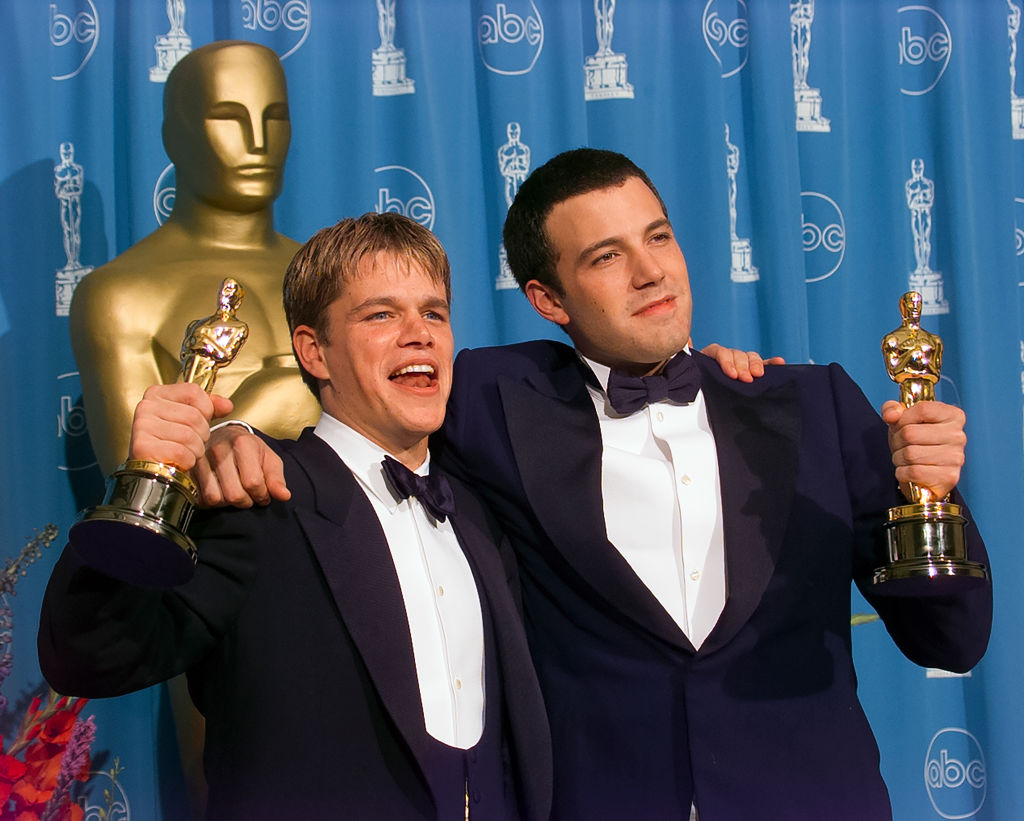 LOS ANGELES, CALIFORNIA - MARCH 23: Winners Ben Affleck and Matt Damon hold their Oscar Awards backstage at Academy Awards Show, March 23, 1998 in Los Angeles, California (Photo by Getty Images/Bob Riha, Jr.)