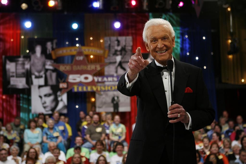 FILE - Legendary game show host Bob Barker reacts during filming of a special prime-time episode of "The Price Is Right," in Los Angeles April 17, 2007, celebrating his retirement and career on the popular game show. (AP Photo/Kevork Djansezian, File)