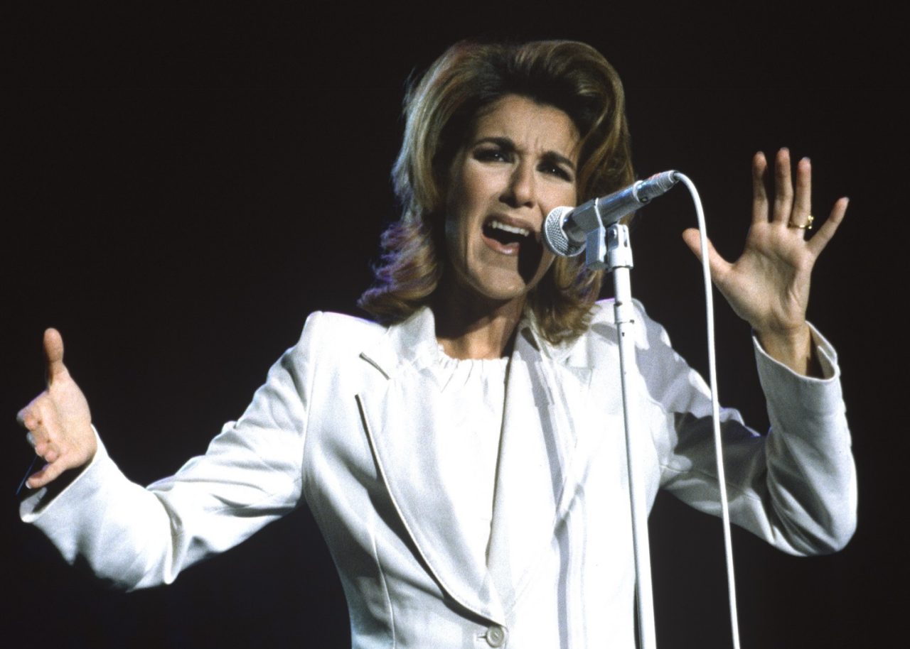 Celine Dion performs at Shoreline Amphitheatre on August 29, 1996 in Mountain View, California. (Photo by Tim Mosenfelder/Getty Images)