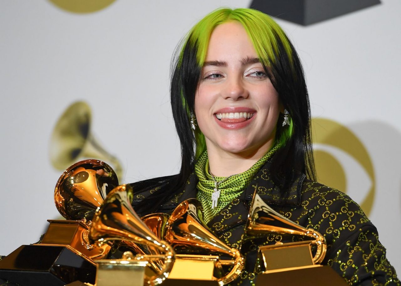 US singer-songwriter Billie Eilish poses in the press room with the awards for Album Of The Year, Record Of The Year, Best New Artist, Song Of The Year and Best Pop Vocal Album during the 62nd Annual Grammy Awards on January 26, 2020, in Los Angeles. (Photo by Frederic J. BROWN / AFP) (Photo by FREDERIC J. BROWN/AFP via Getty Images)