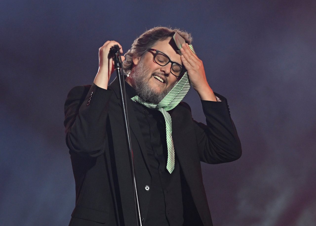 Les Cowboys Fringants lead singer pauses during a song in their performance at the Quebec Summer Festival, in Quebec City, Monday, July 17, 2023. Tremblay is currently battling cancer. THE CANADIAN PRESS/Jacques Boissinot