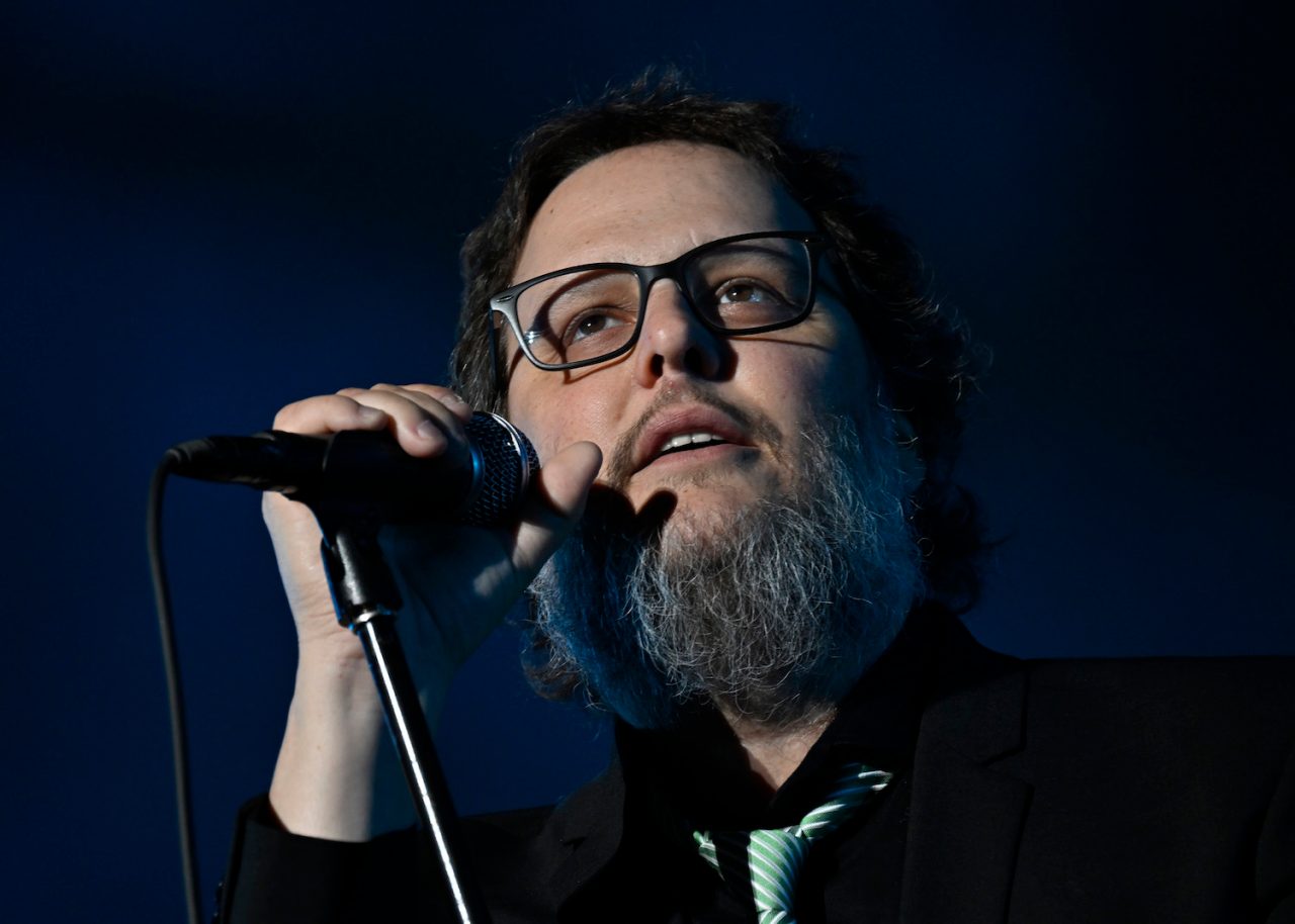 Les Cowboys Fringants lead singer Karl Tremblay pauses during their performance at the Quebec Summer Festival, in Quebec City, Monday, July 17, 2023. Tremblay is currently battling cancer. THE CANADIAN PRESS/Jacques Boissinot