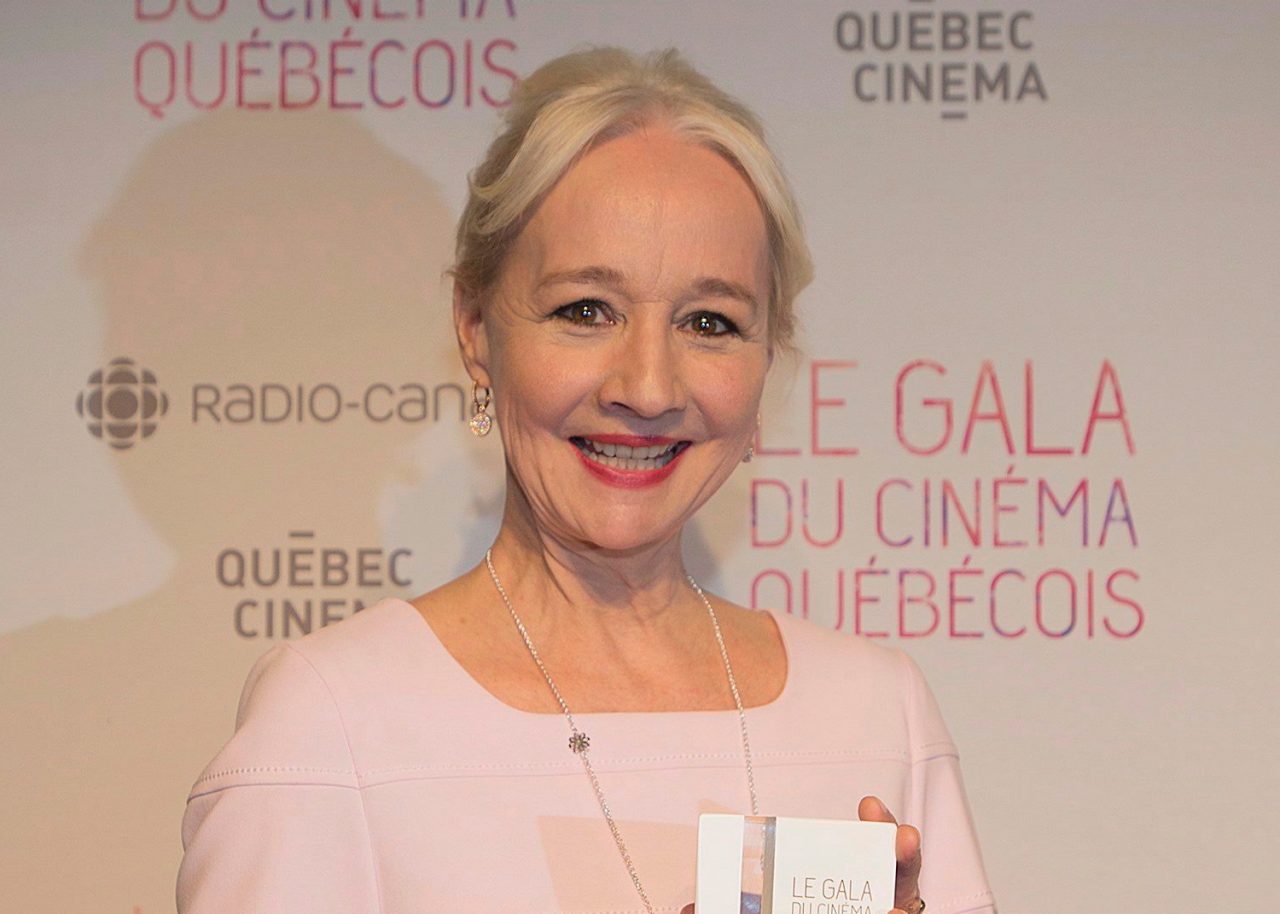 Diane Lavallee holds up her trophy for best supporting actress at the Quebec Cinema awards ceremony in Montreal, Sunday, March 20, 2016. THE CANADIAN PRESS/Graham Hughes