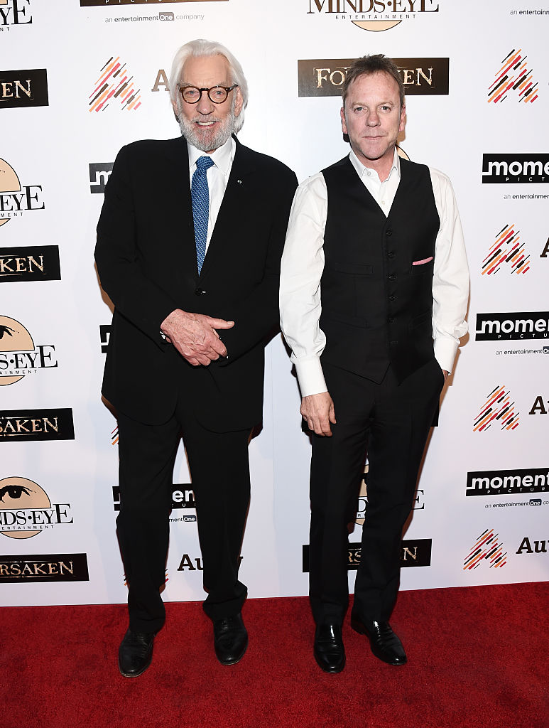 LOS ANGELES, CA - FEBRUARY 16:  Actors Donald Sutherland (L) and Kiefer Sutherland arrive at a screening for Momentum Pictures' "Forsaken" at the Autry Museum of the American West on February 16, 2016 in Los Angeles, California.  (Photo by Amanda Edwards/WireImage)