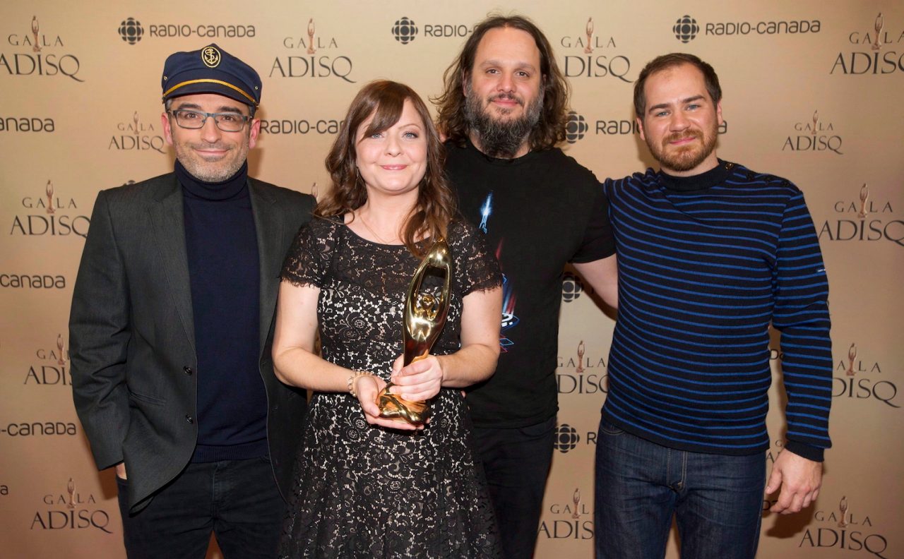 Les Cowboys Fringants hold up their award for rock album of the year at the Gala Adisq awards ceremony in Montreal, Sunday, October 30, 2016. THE CANADIAN PRESS/Graham Hughes