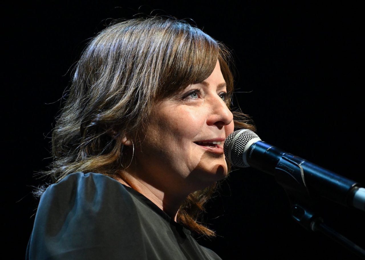 Marie-Annick Lepine speaks to the crowd during an event paying tribute to the late Karl Tremblay, lead singer with Les Cowboys Fringants, in Montreal, Tuesday, November 28, 2023. THE CANADIAN PRESS/Graham Hughes