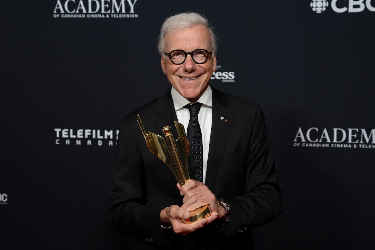 Pierre Bruneau holds his lifetime achievement award at the News, Documentary and Factual Awards evening at the Canadian Screen Awards, in Toronto, on Tuesday, April 11, 2023. THE CANADIAN PRESS/Chris Young