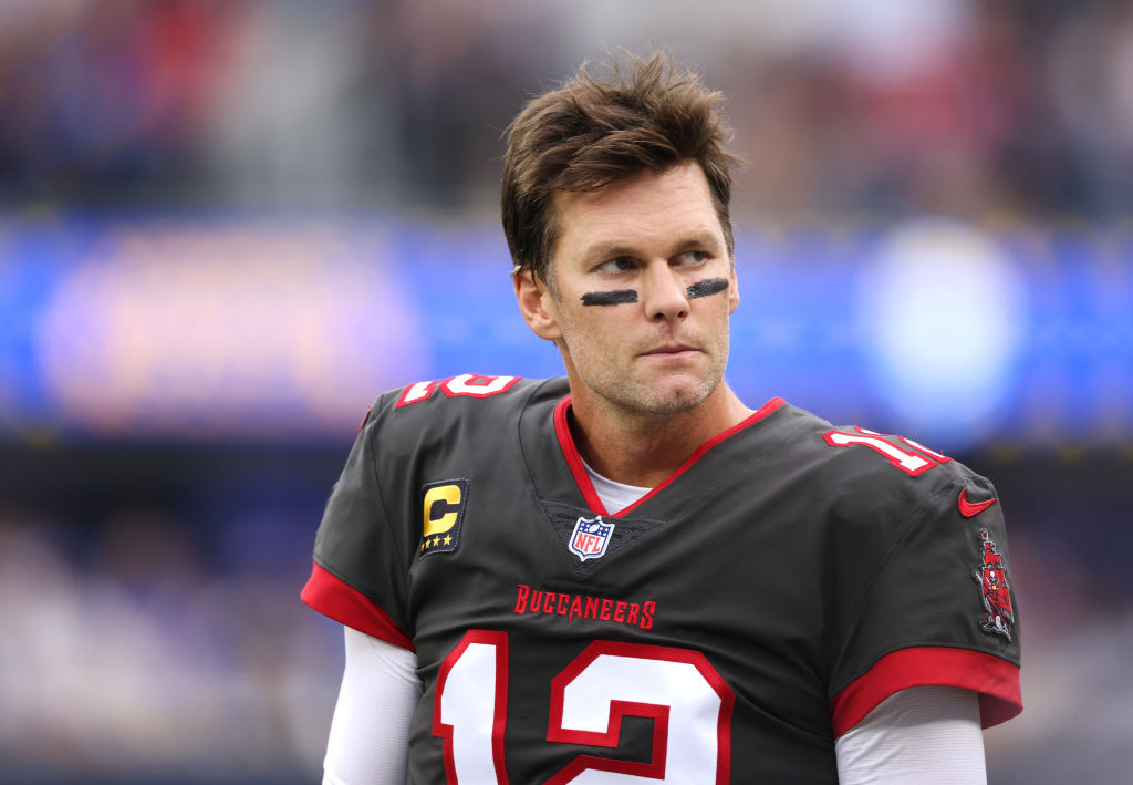 INGLEWOOD, CALIFORNIA - SEPTEMBER 26: Tom Brady #12 of the Tampa Bay Buccaneers on the sideline during the first quarter in the game against the Los Angeles Rams at SoFi Stadium on September 26, 2021 in Inglewood, California. (Photo by Harry How/Getty Images)